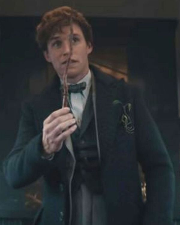 Actor Newt Scamander Wearing Navy Blue Coat In Movie The Secrets of Dumbledore 2022